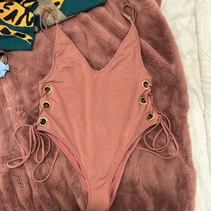 Neon blonde one piece suit